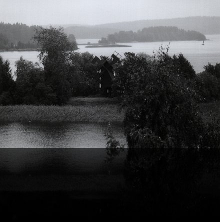 Small island in a lake around Kuopio - black and white